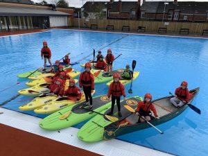 Group rafted on the outdoor pool.